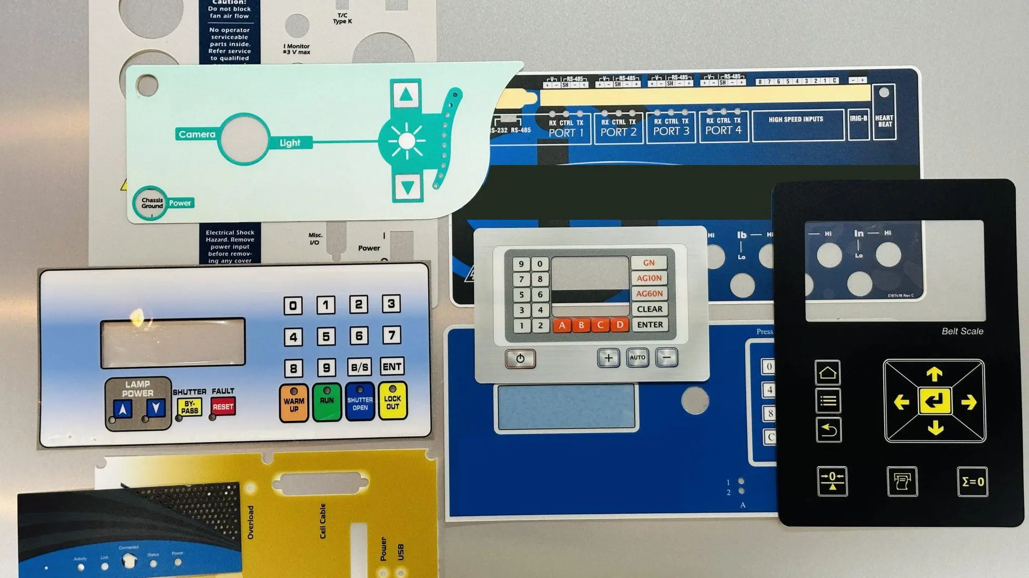 Custom graphic overlay with precision cutouts for membrane switches.