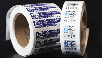 UL-compliant label rolls with branding, barcodes, and compliance icons for equipment identification, produced in the Bay Area, CA.
